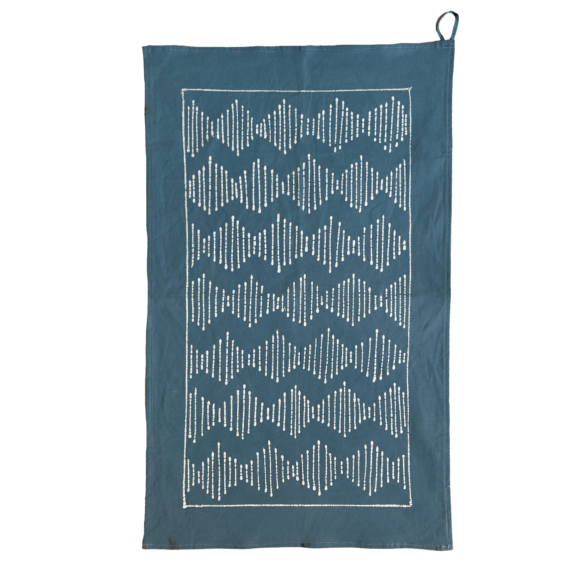 Blue kitchen towel with white geometric batik pattern 