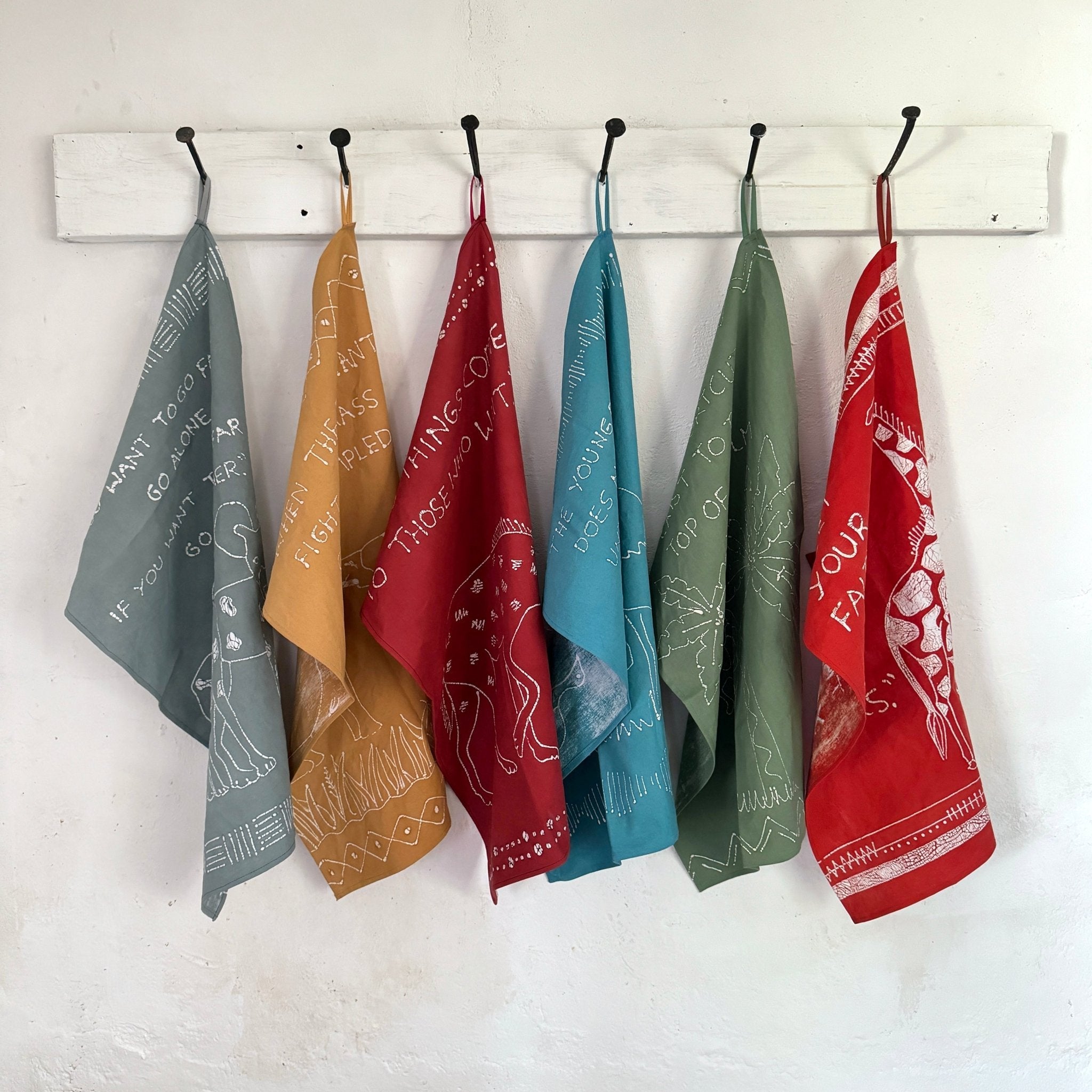 Vibrant kitchen towel designs for your home with hand drawn animals.