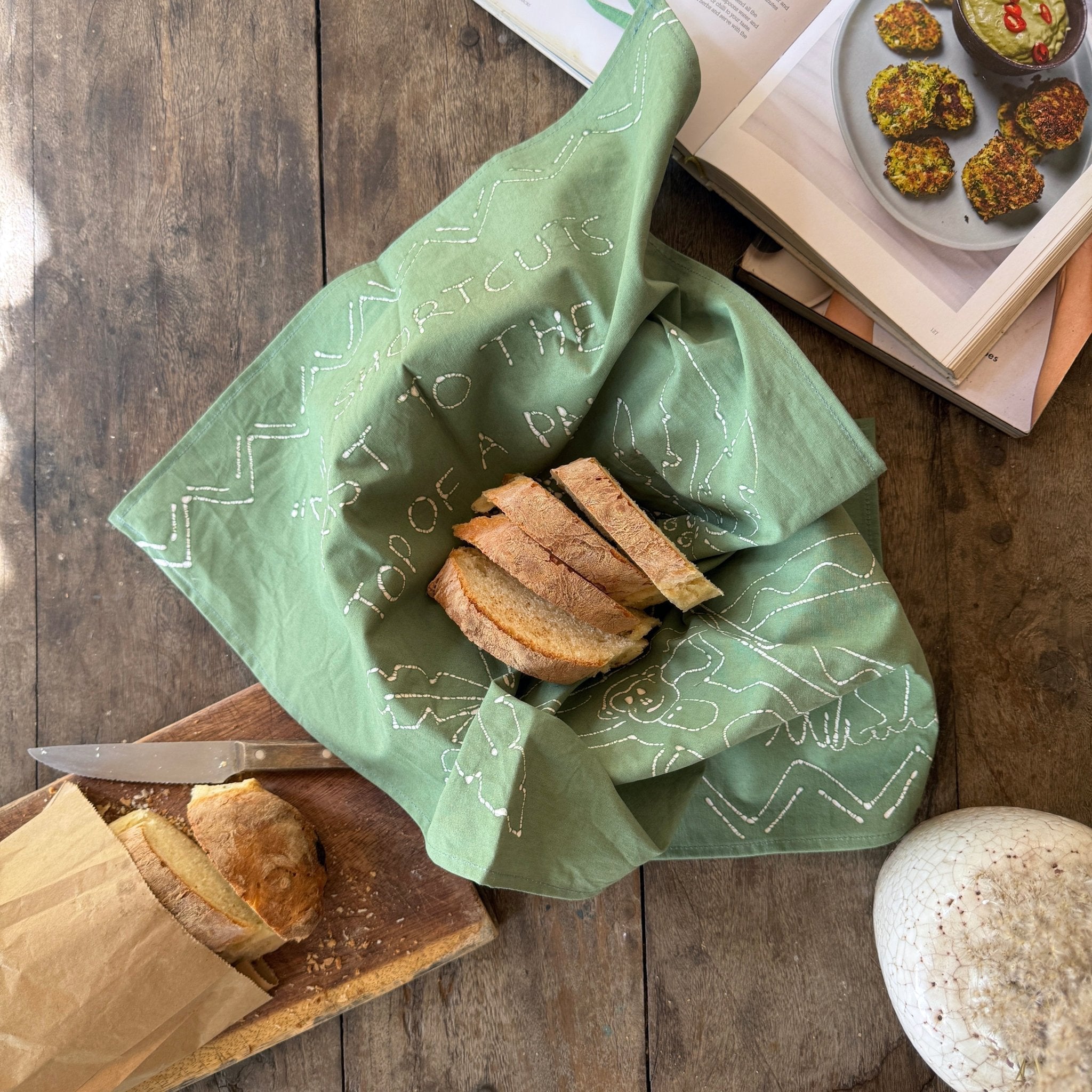 Home kitchen goods green tea towel with monkey design.
