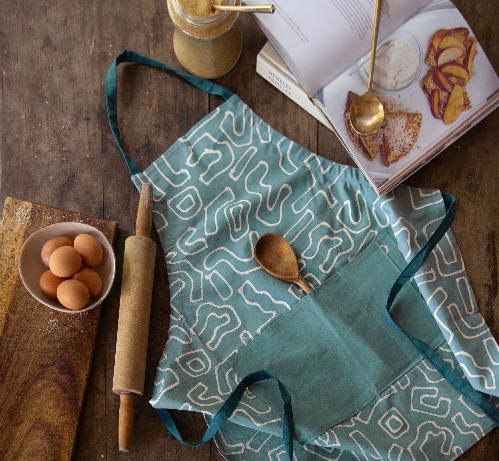 The perfect bohemian chic light blue cotton apron adorned with a funky squiggle pattern.