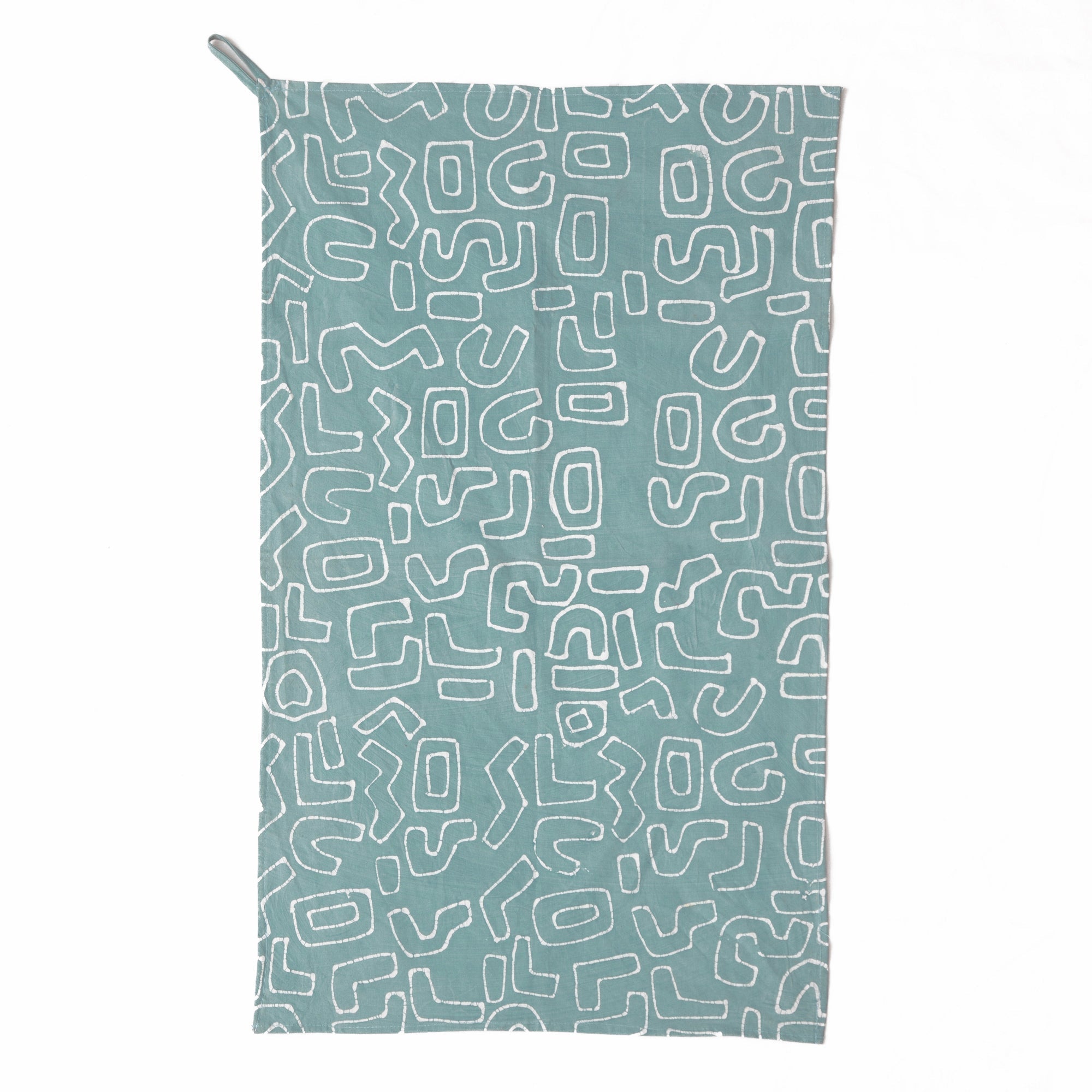 The perfect light blue tea towel made from 100% cotton, and adorned with our signature Kuba squiggle pattern.