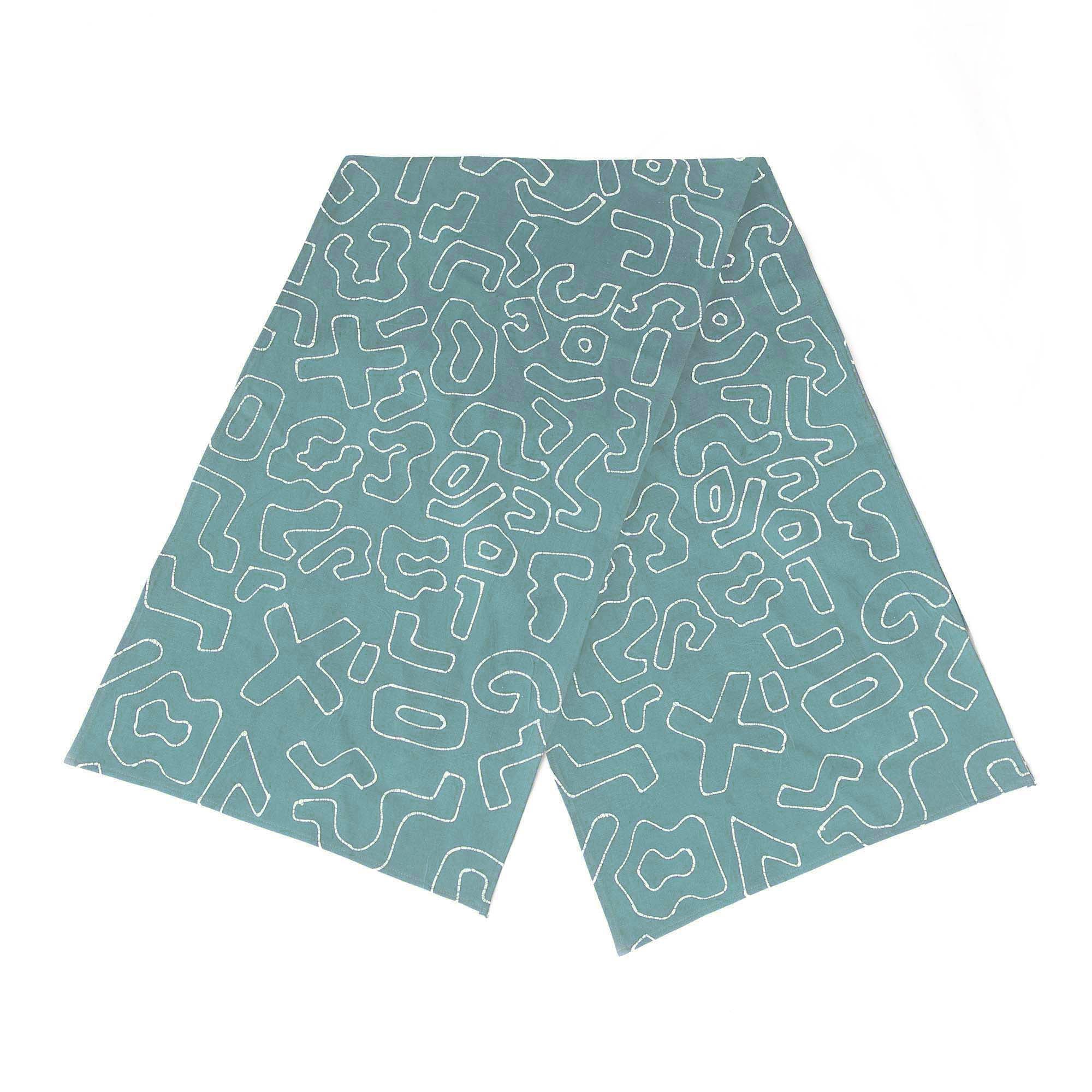 a bold light blue table runner ethically handcrafted in zambia