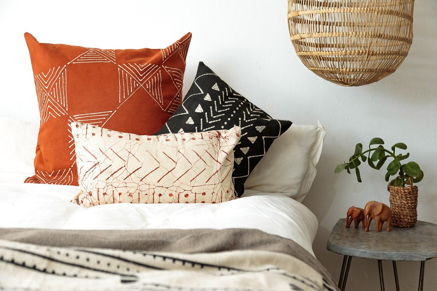 Eco-friendly throw pillow featuring authentic Mali mud cloth pattern.