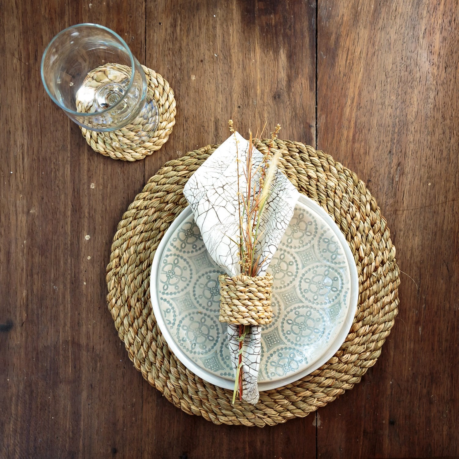 African made grass twist woven coaters that come in a set of 4, making them the perfect sustainable gift.
