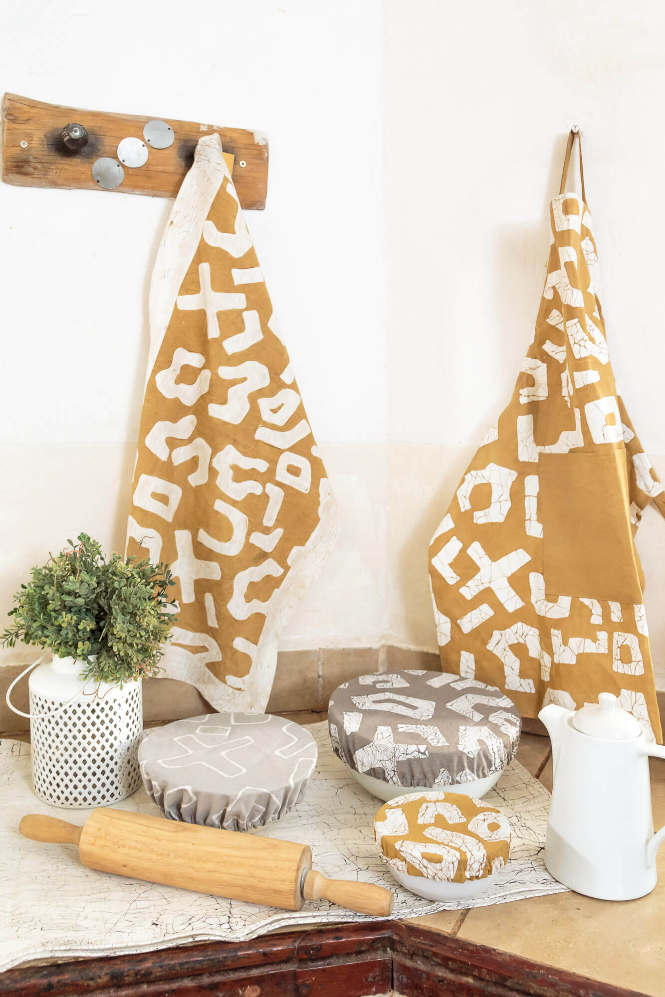Hand-painted and designed bowl covers, in light taupe, to keep your food stylishly fresh.