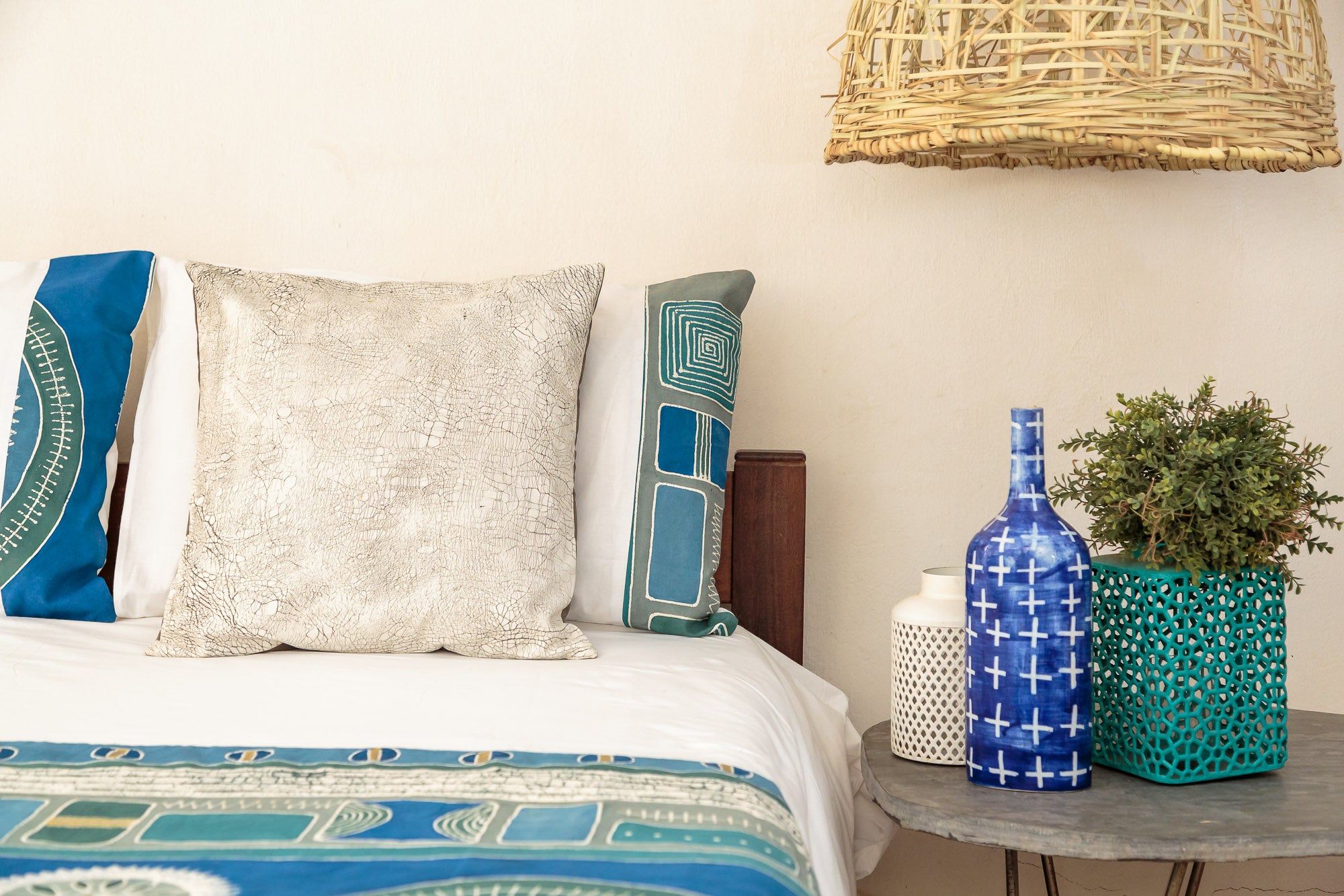 African-inspired duvet cover set in vibrant blue aqua, with matching pillows.