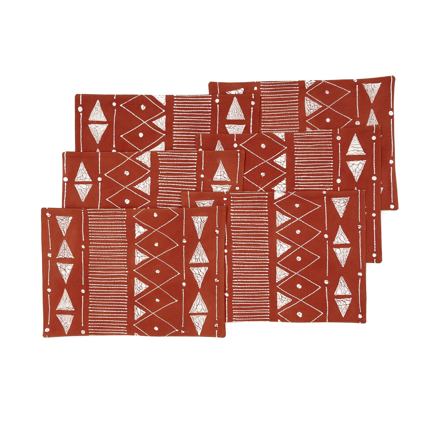 Deep red rust table mats with white linear patterns, to dazzle your dinner party diners.