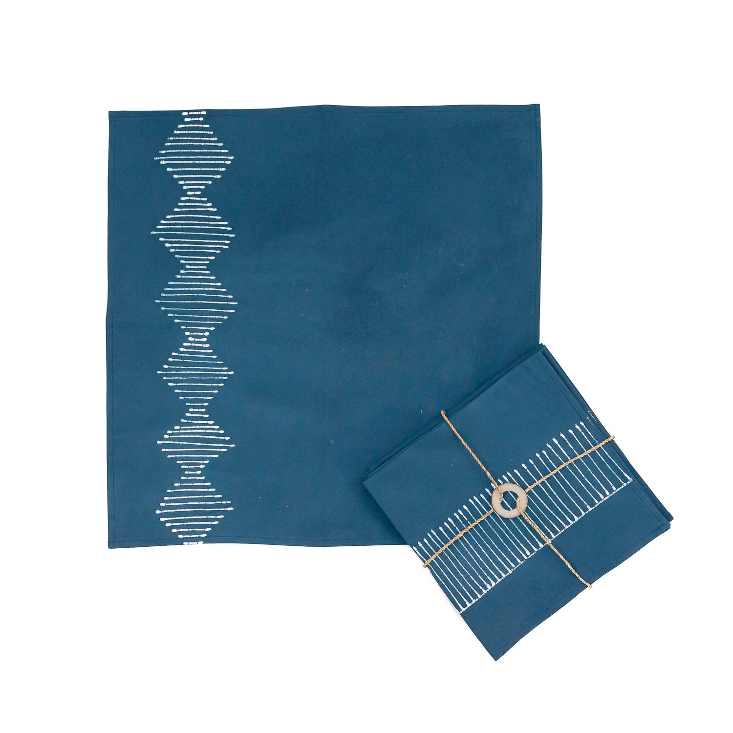 African made indigo blue napkins adorned with geometric patterns.