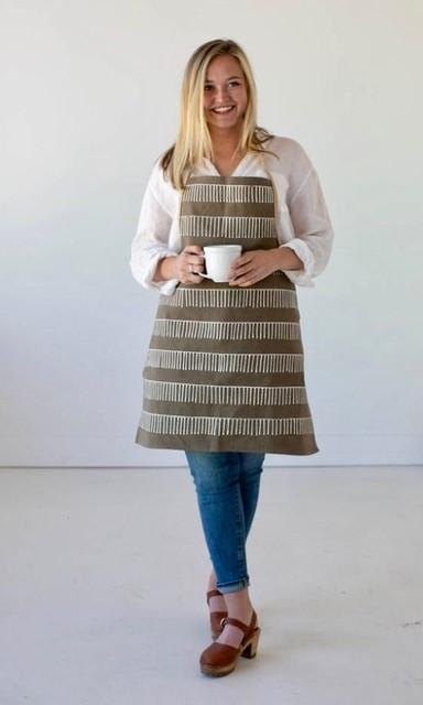 Dark taupe apron with stunningn linear patterns adorned onto 100% cotton.